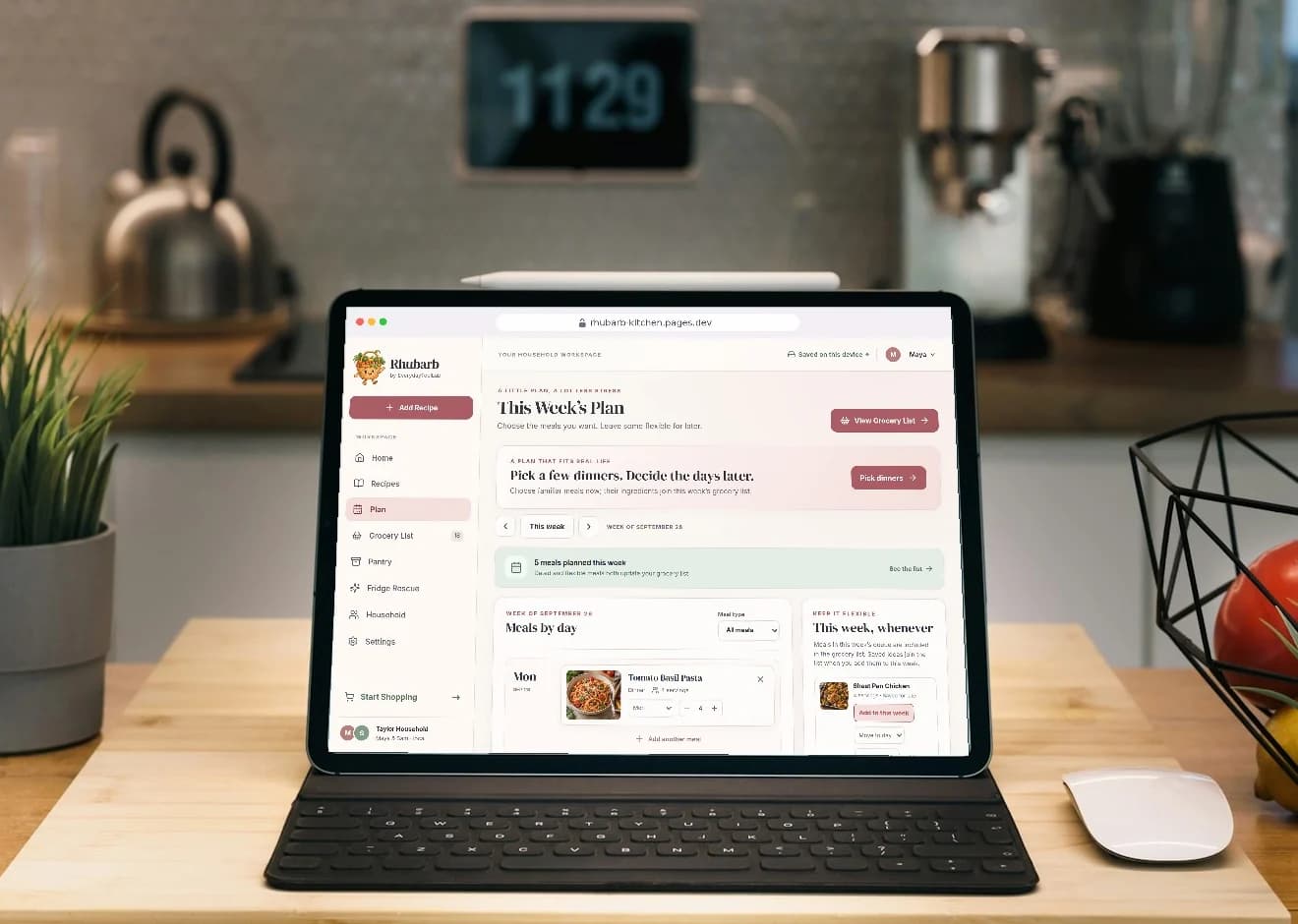 Rhubarb open in a web browser on a laptop on a kitchen counter, showing this week's dinner plan