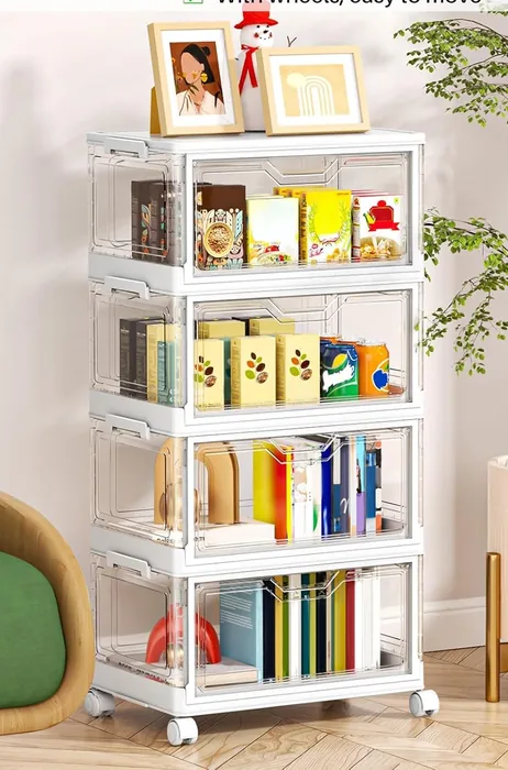 Clear stackable storage bins with front-opening doors and wheels, contents visible through the transparent sides.